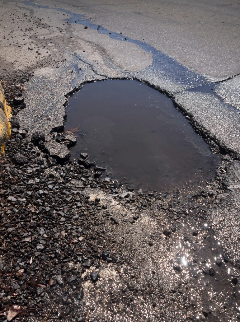 professional parking lot repair technician at work